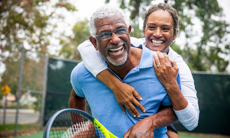 Man and woman playing tennis
